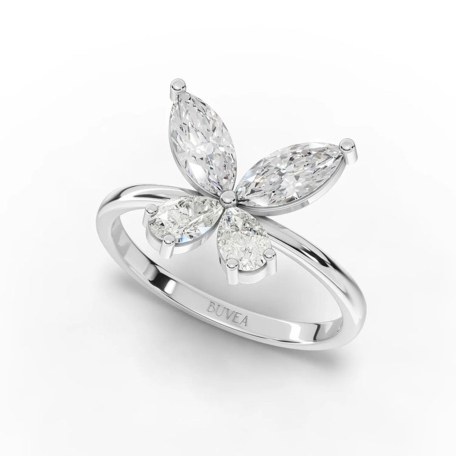1.01 Ct lab diamond ring featuring a butterfly motif with pear and marquise diamonds set on a slender 18k gold band.