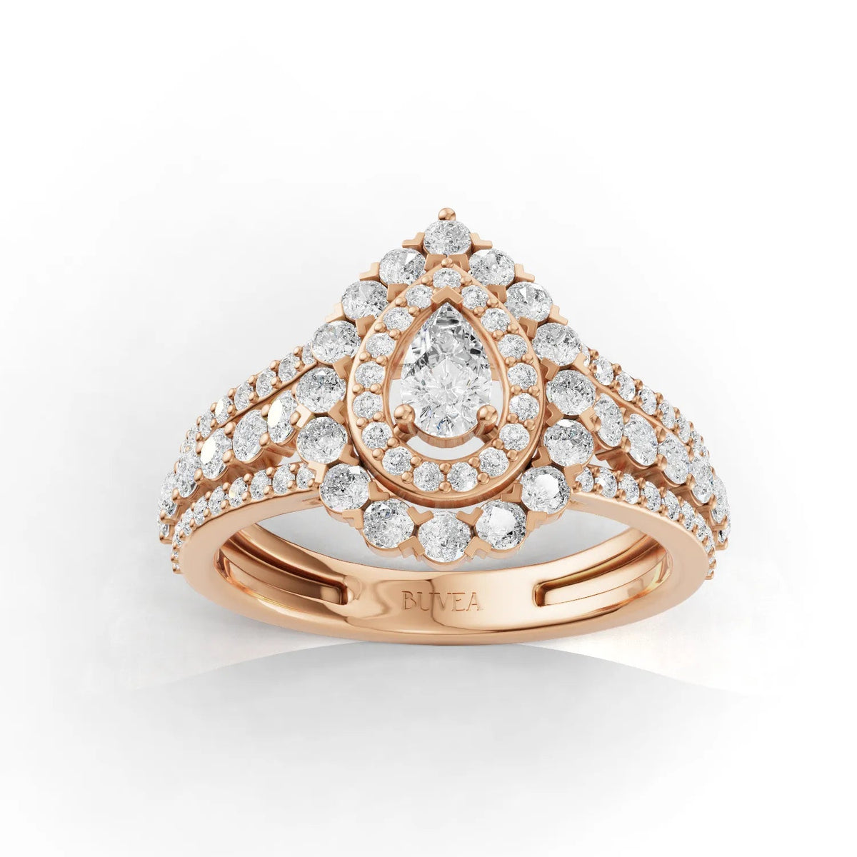 1.04 Ct pear-shaped double halo pavé set lab diamond ring in 18K rose gold, featuring three rows of pavé diamonds.