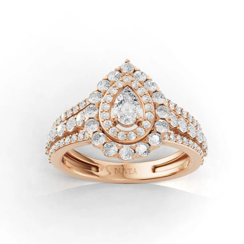 1.04 Ct pear-shaped double halo pavé set lab diamond ring in 18K rose gold, featuring three rows of pavé diamonds.