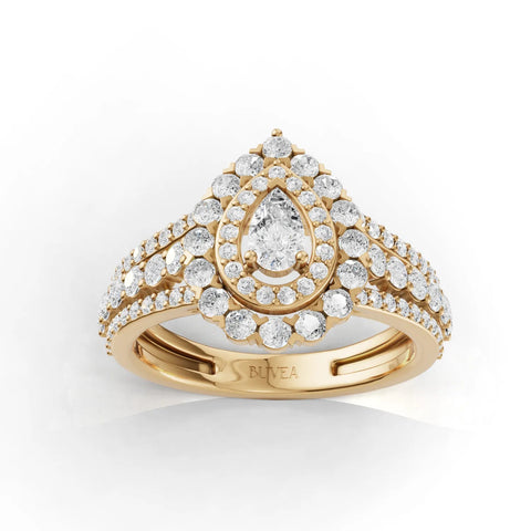 1.04 Ct pear-shaped double halo pavé set lab diamond ring in 18K gold, featuring a center diamond and multiple round diamonds.