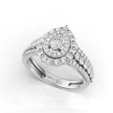 1.04 Ct pear-shaped lab diamond ring with double halo in 18K gold, featuring pavé diamonds on the upper shank.