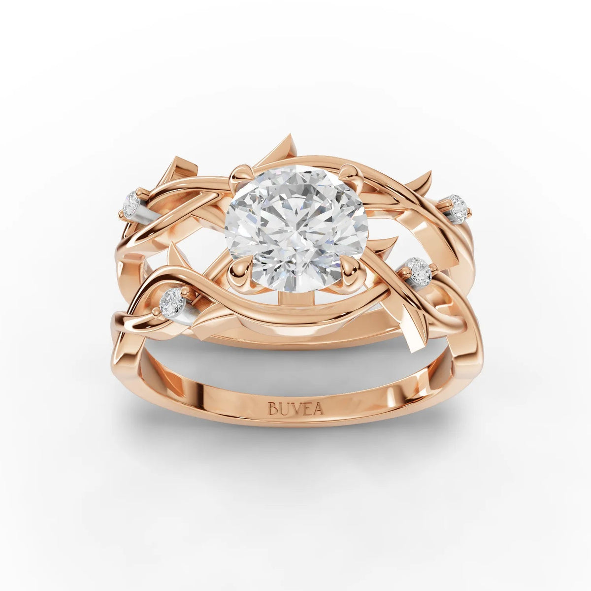 1.06 Ct round lab diamond ring with floral-inspired intertwined rose gold bands and accent diamonds on both sides.