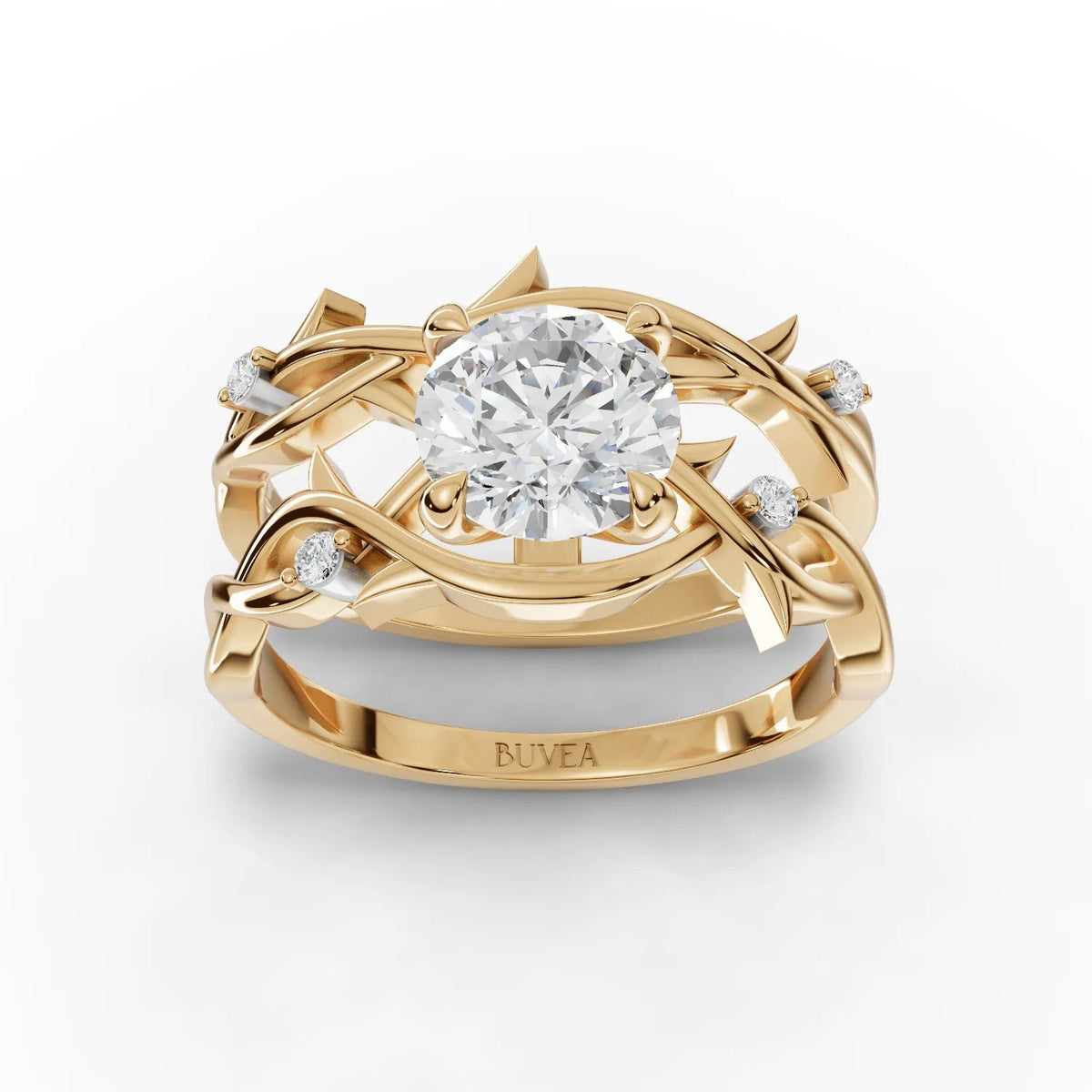 1.06 Ct round lab diamond ring with floral-inspired intertwined golden bands and accent diamonds on each side.