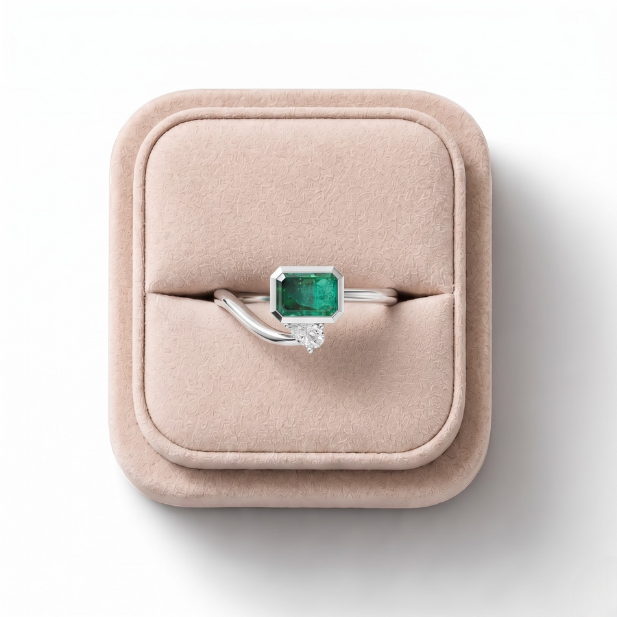 1.09 CT Emerald Open Bypass Ring with Lab Grown Diamond in white gold, on a white background