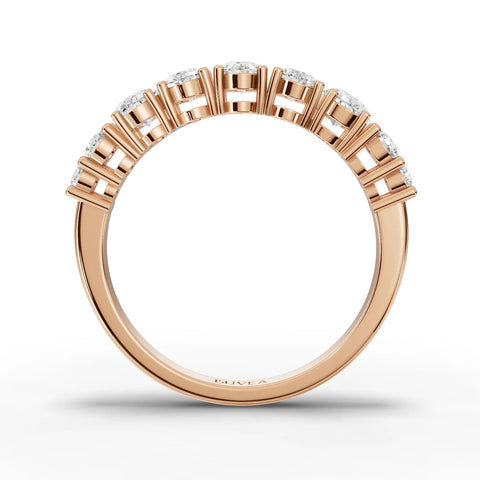 Rose gold ring featuring a half eternity design with oval lab diamonds and round accent diamonds for a refined look.