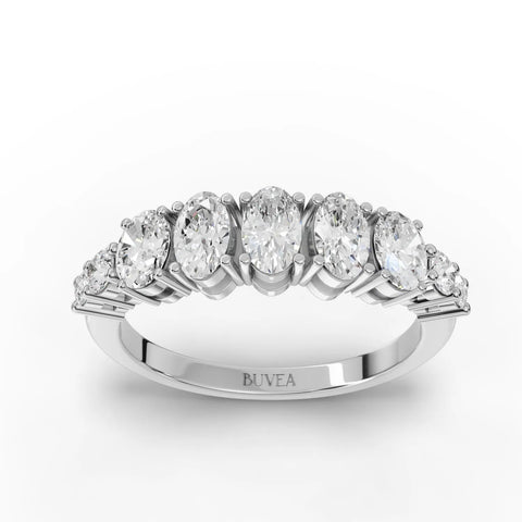 Oval half eternity lab diamond ring featuring a row of oval and round diamonds set in 18K gold for a refined look.