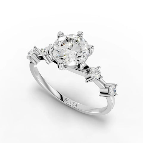 Round solitaire lab diamond ring featuring a 1 CT center stone and three accent diamonds set in a polished white gold band.
