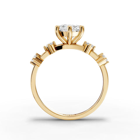 1.16 CT round accent solitaire lab diamond ring in yellow gold features a 1 CT round center stone and smaller accent diamonds.