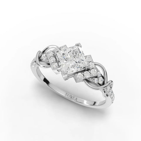 A 1.18 CT princess cut lab-grown diamond ring features a square center stone with a swirl band adorned with accent diamonds.