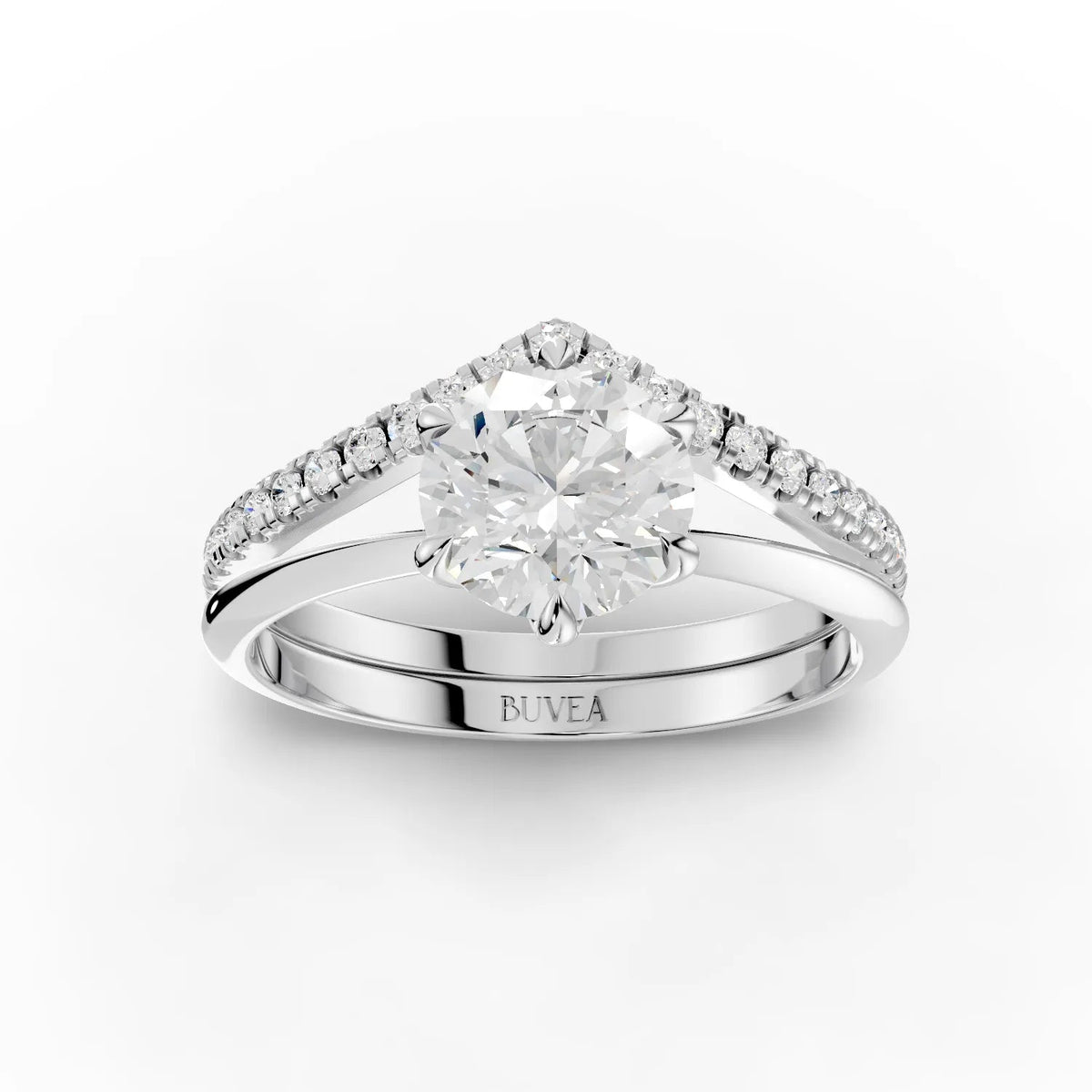 Elegant 1.19 CT round solitaire ring features a six-prong setting and a V-shaped band adorned with accent diamonds.