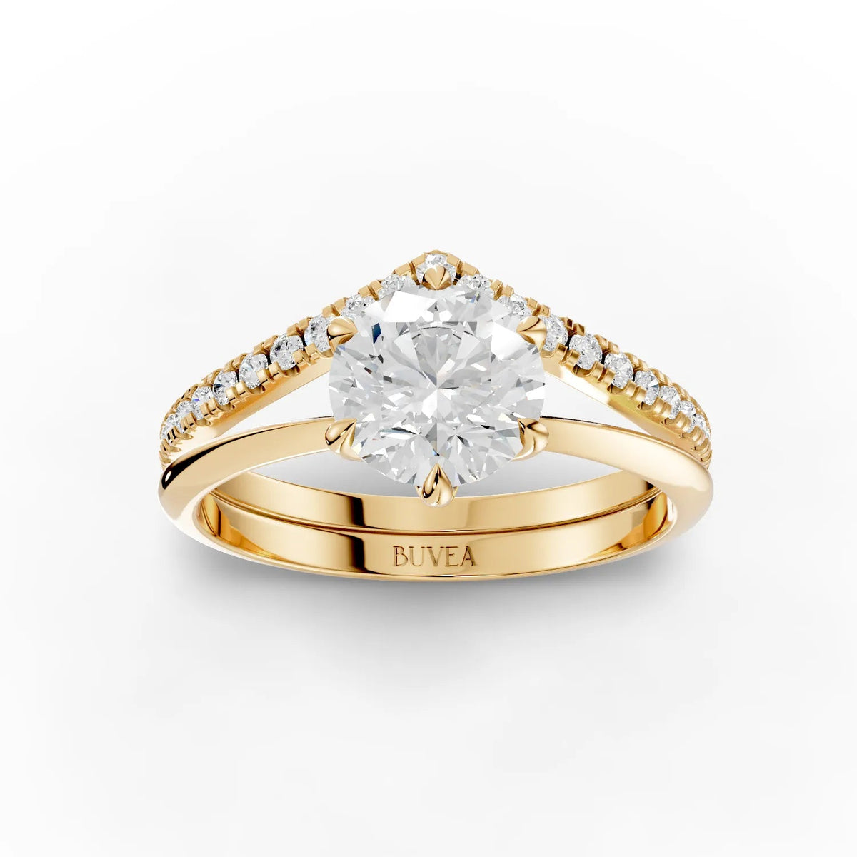 1.19 CT round solitaire lab grown diamond ring features a V-shaped band with accent diamonds, all set in yellow gold.