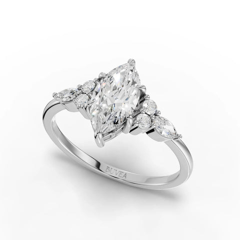 1.20 Ct marquise solitaire ring featuring a central marquise diamond and side accent diamonds, set in 18K white gold.