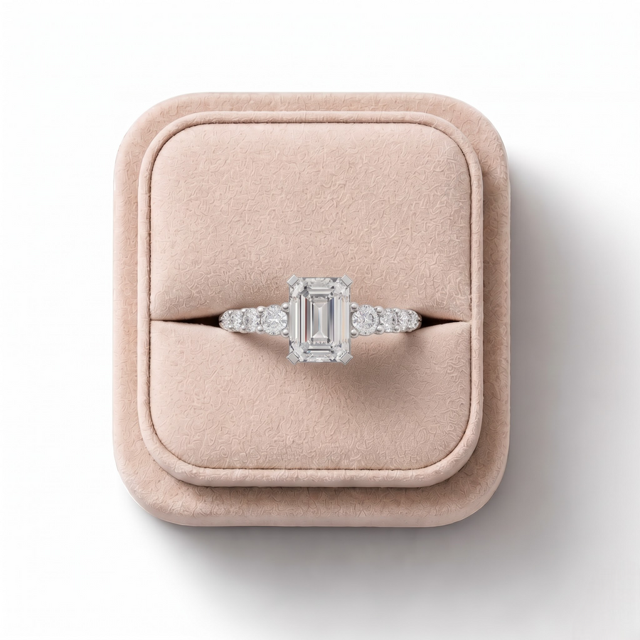 1.24 CT Emerald Solitaire Lab Grown Diamond Ring with Graduated Pavé Band in white gold, on a white background