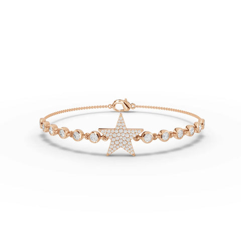 Pavé star charm bracelet made of rose gold, adorned with round lab grown diamonds and a delicate chain.