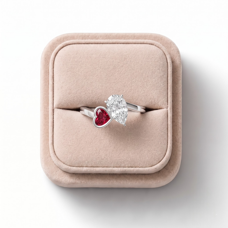 1.35 CT Pear With Heart Ruby Bypass Lab Grown Diamond Ring 1.00 CT Center in white gold, on a white background