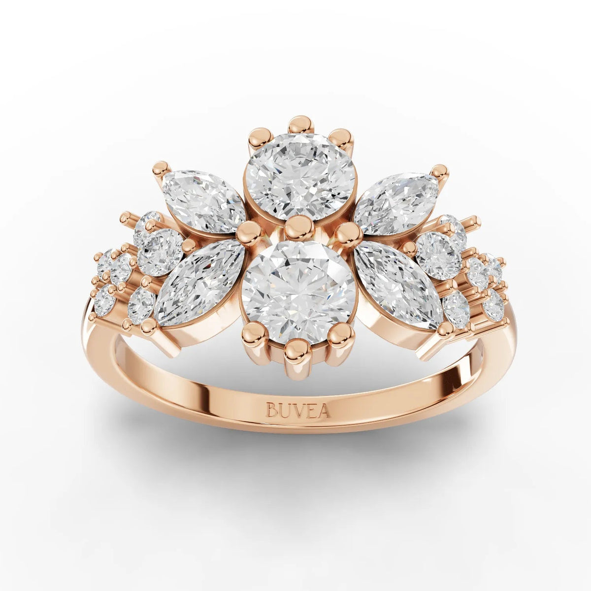 Floral multi-shape lab diamond ring with two central round diamonds, marquise accents, and an 18K gold band.