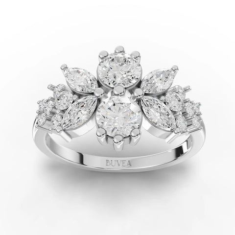 Floral multi-shape lab diamond ring featuring a cluster of round and marquise diamonds in an 18K gold setting.