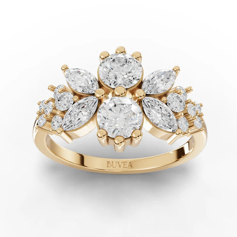 Floral multi-shape lab diamond ring featuring round and marquise diamonds in an 18K gold setting.