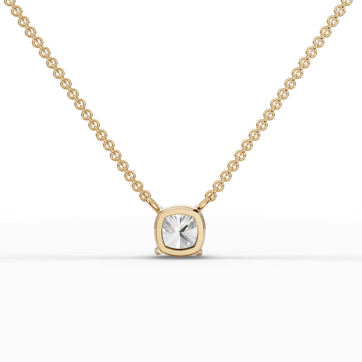 Lab-grown cushion diamond pendant yellow gold close-up