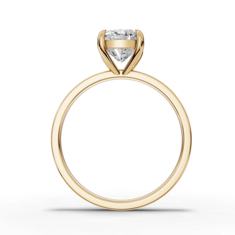 Lab-grown cushion solitaire ring yellow gold close-up