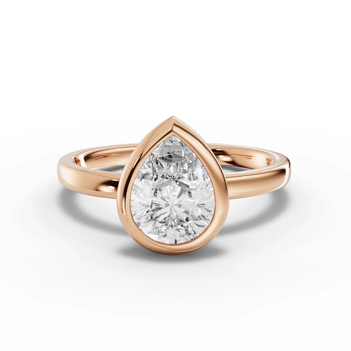 Pear bezel diamond ring rose gold angle