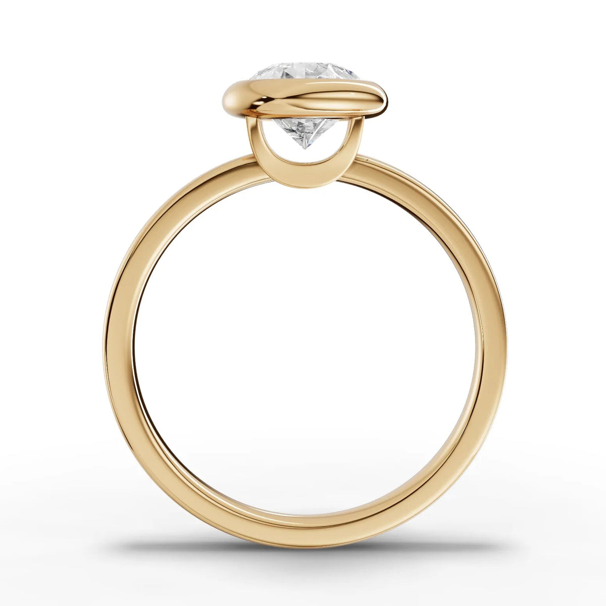 Pear bezel lab-grown ring yellow gold close-up