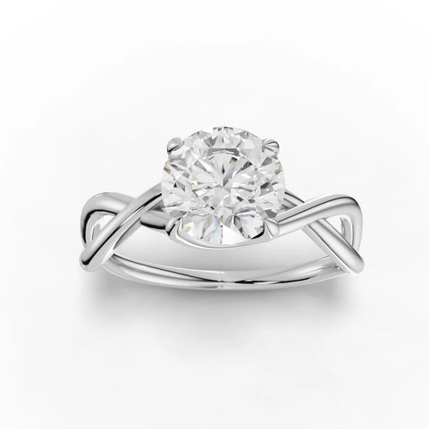1.50 Ct round lab grown diamond solitaire ring with a polished 18k gold band and a minimalist design showcasing the diamond.