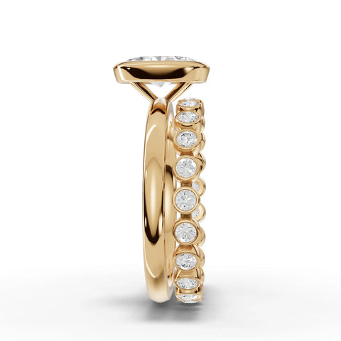 1.63 Ct oval solitaire ring with a bezel setting, featuring a polished 18K gold band and side bezel-set diamonds.