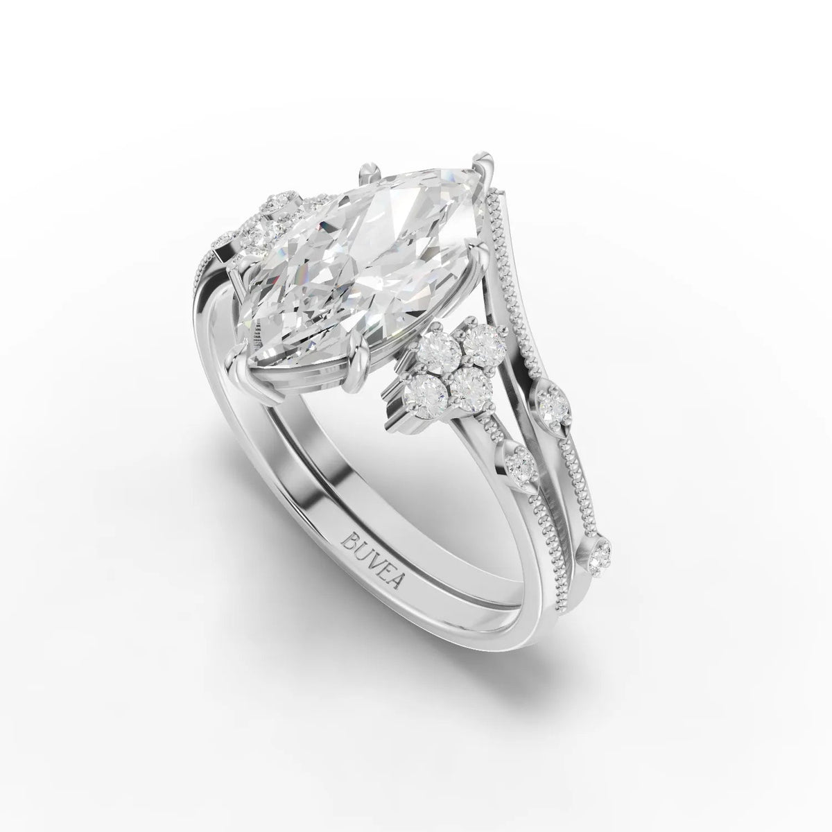 1.65 Ct marquise lab grown diamond ring features a large center stone and delicate accent stones, set in a polished white metal band.