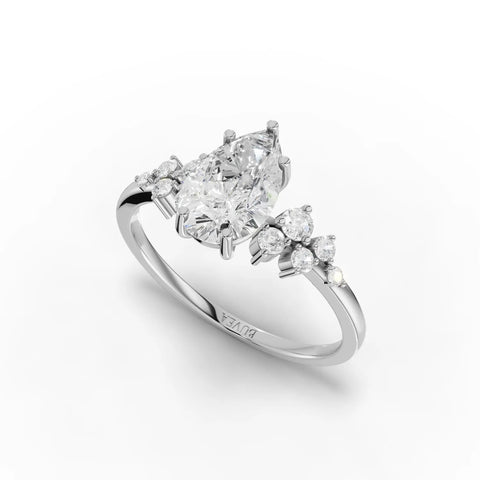 1.70 CT pear-shaped lab-grown diamond ring featuring round accent stones, set in a polished white gold band.