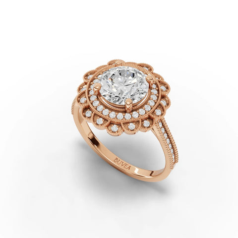 1.72 Ct round double halo lab diamond ring in rose gold, featuring a prominent center stone surrounded by two halo layers and pavé diamonds.