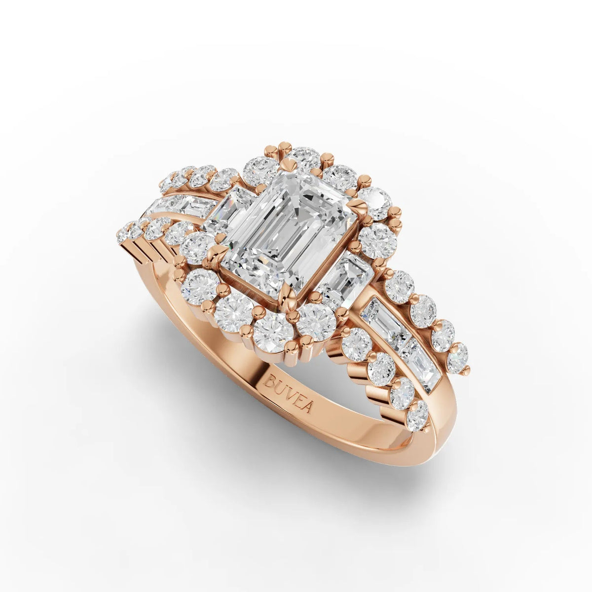 Emerald cut center stone halo ring in rose gold, featuring baguette and round lab-grown diamonds with a polished band.