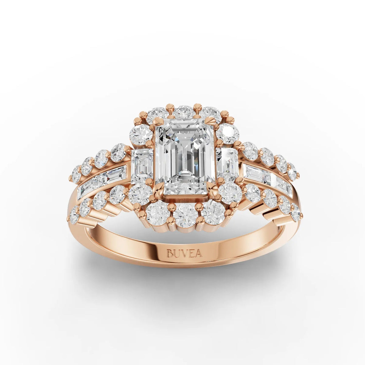 1.81 CT emerald cut halo lab-grown diamond ring with round and baguette side stones, set in rose gold.