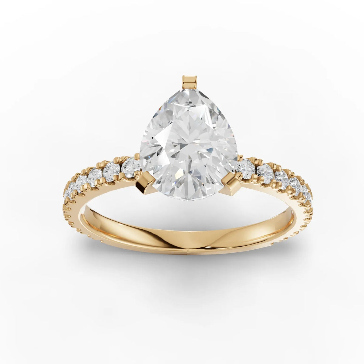 Yellow gold pear pavé diamond ring