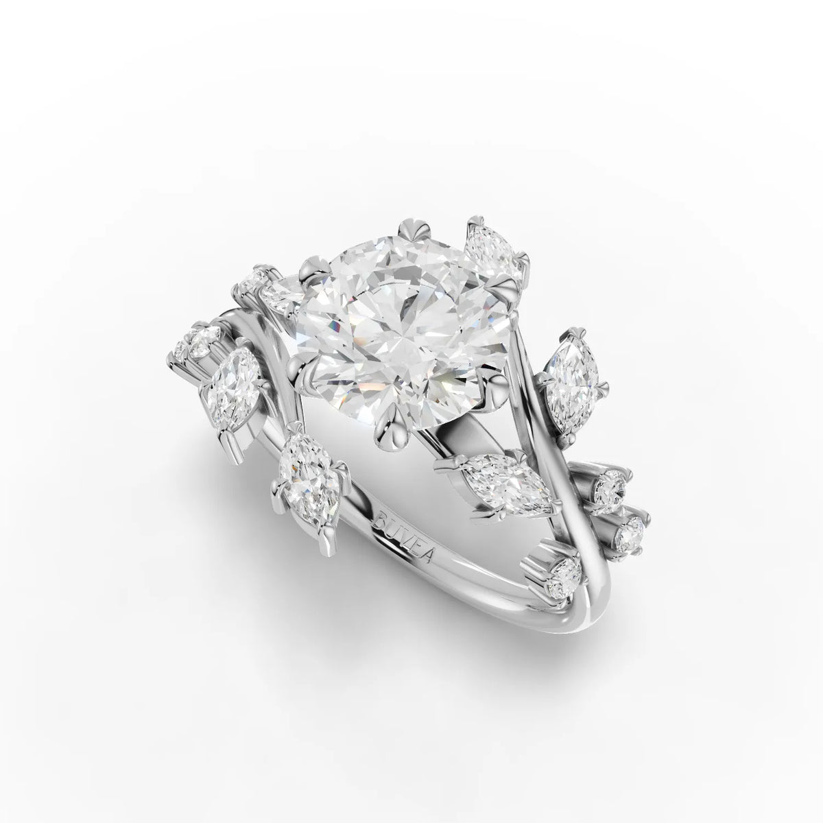 Solitaire ring featuring a 1.97 ct round lab diamond, with vine-inspired accents and a polished white gold band.