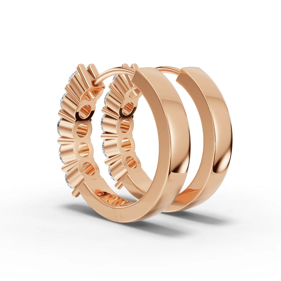 Rose gold diamond huggie earrings close-up