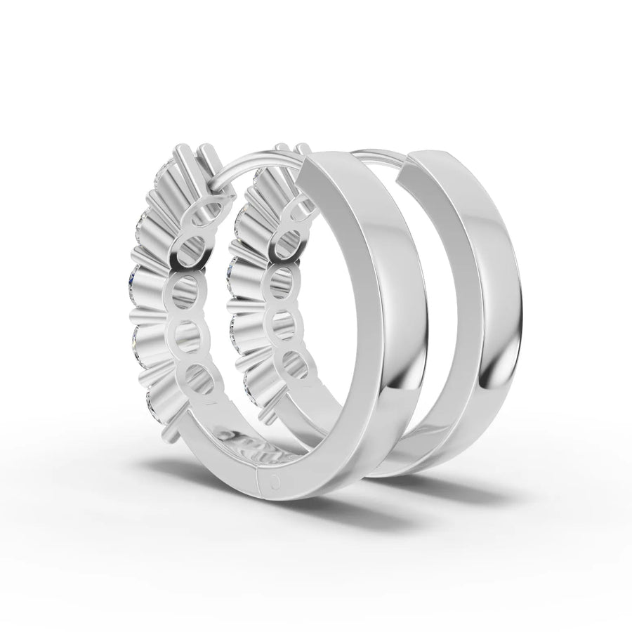 White gold diamond huggie earrings close-up