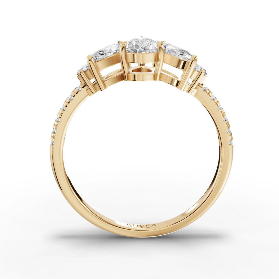 Pear marquise diamond ring yellow gold close-up