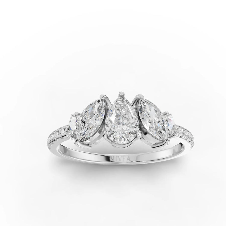 1.19 CT three-stone lab diamond ring with pear center, marquise side stones, and pavé sterling silver band