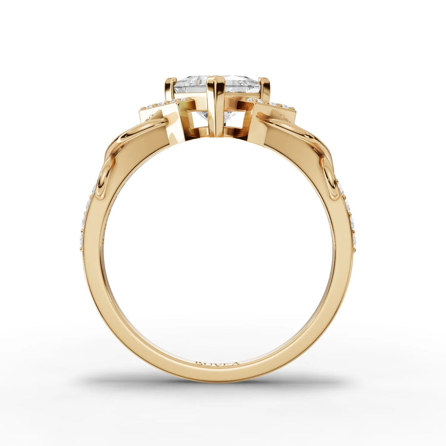 Princess cut swirl diamond ring yellow gold close-up