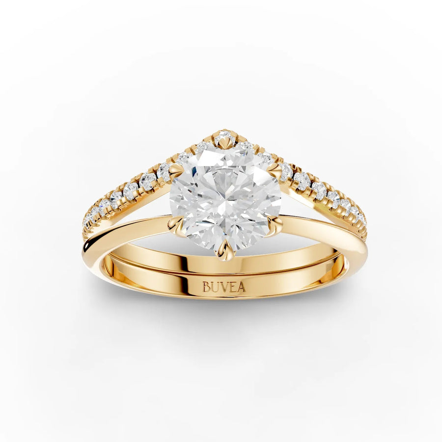 1.19 CT round solitaire lab grown diamond ring features a V-shaped band with accent diamonds, all set in yellow gold.