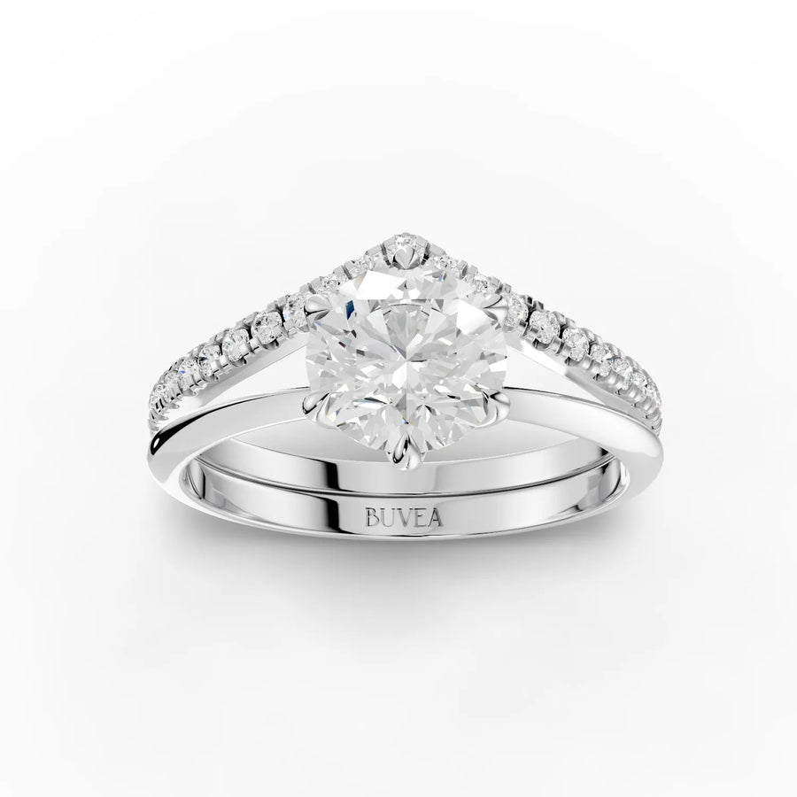 Elegant 1.19 CT round solitaire ring features a six-prong setting and a V-shaped band adorned with accent diamonds.