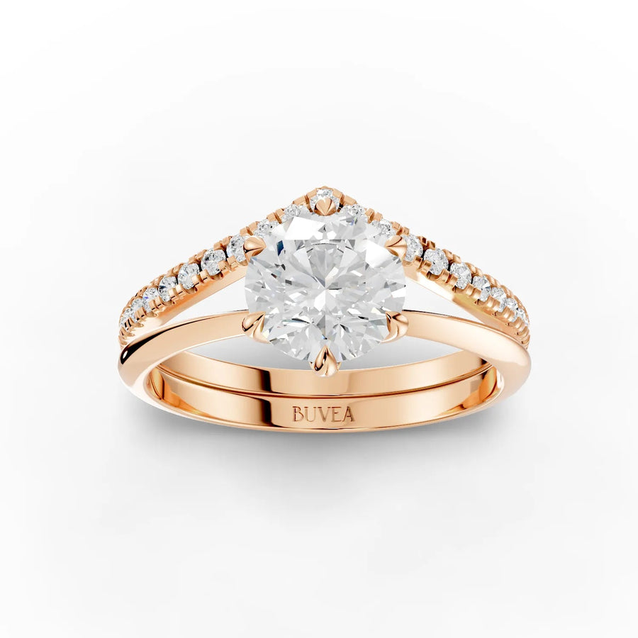 1.19 CT round solitaire ring in rose gold, featuring a prominent center diamond and accent diamonds along a V-shaped band.