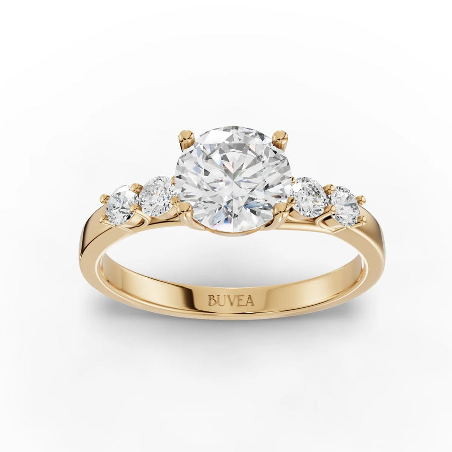 Three-stone lab-grown diamond ring yellow gold top view