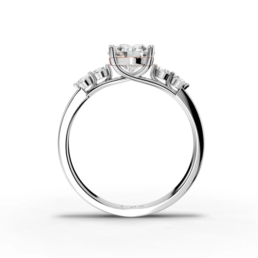 Round center three-stone ring white gold close-up