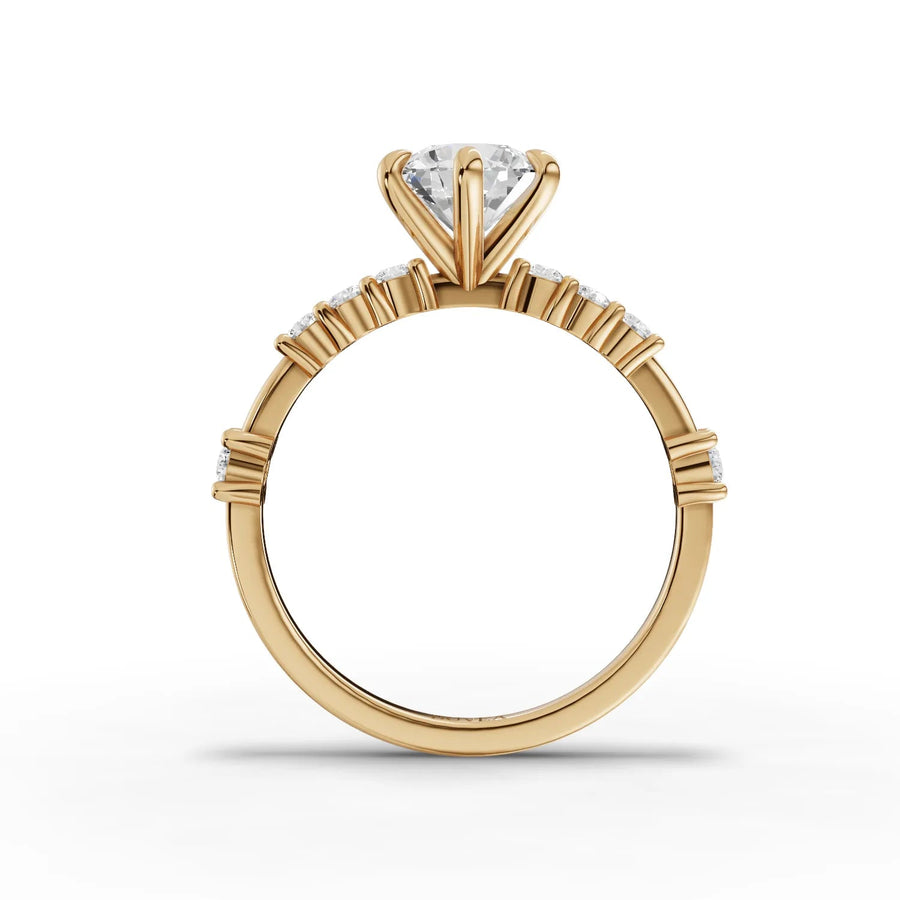 1.24ct Round center accented ring yellow gold close-up