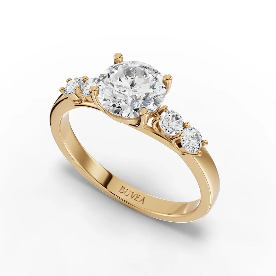 1.24 CT three-stone ring yellow gold angle