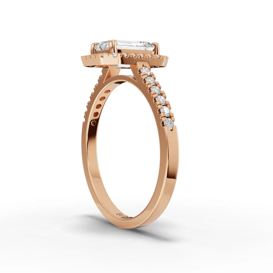 Emerald halo ring rose gold close-up