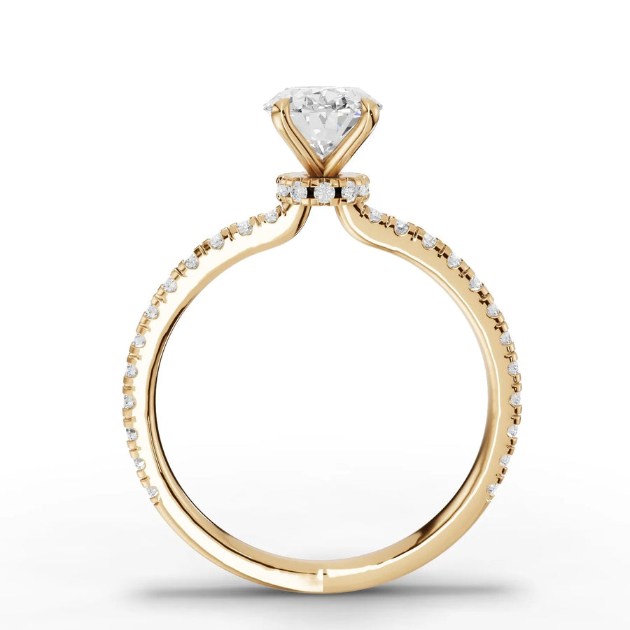 Oval lab-grown diamond ring yellow gold close-up