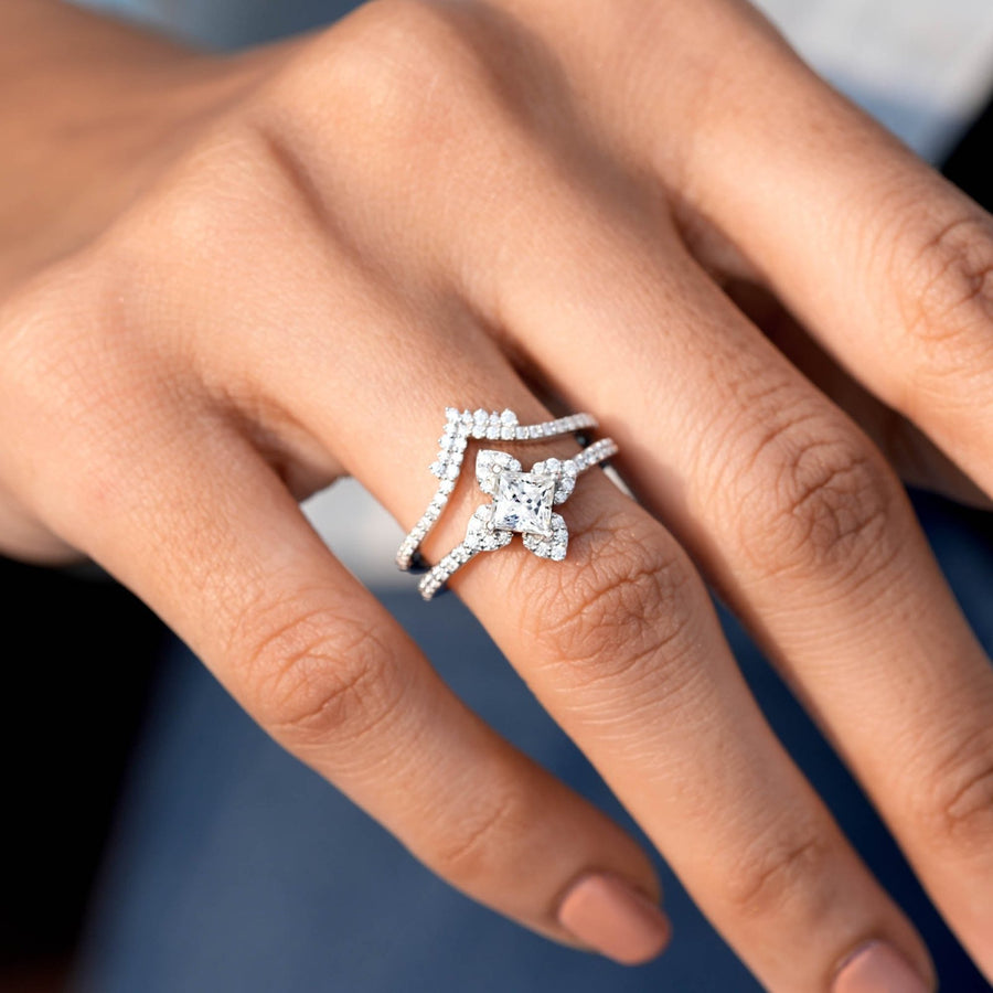 1.63 CT princess cut halo ring set worn on hand